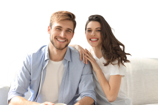 Portrait of cute young couple sitting in sofa on a transparent background