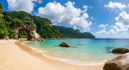 Fototapeta premium Tropical beach with rocks and lush green hills
