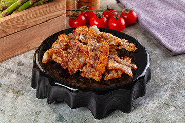 Fried crispy pork bacon snack