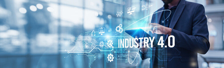 Businessman using tablet analyzing Industry 4.0 and smart manufacturing growth through IoT, AI, big data analytics, and automation driving efficiency, digital transformation in production processes.