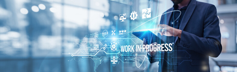 Businessman using tablet analyzing Work In Progress and production growth through efficient resource utilization, and improved cash flow management to enhance profitability and business scalability.