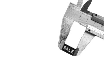 Caliper on white background with inscription sale, business concept.