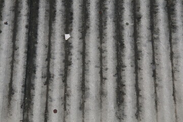 Detailed photo of asbestos roof of a house