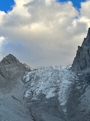 A glacier in the mountains. Aksai, Kyrgyzstan, Ala Archa National Park. Melting glaciers,...