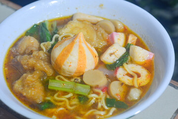 Seblak is a spicy culinary dish from West Java containing crackers and various aci with the main spice kencur.