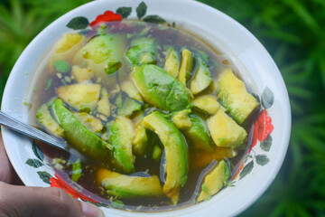 Processed avocado with added liquid sugar