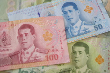 The 100 baht note (100฿) is one of the standard banknotes in Thai currency, the Thai baht (THB). 
