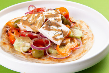 Salad with onions and feta cheese.