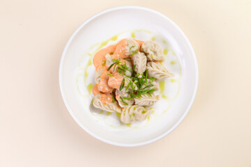 Traditional dumplings, Vareniki with sauce.