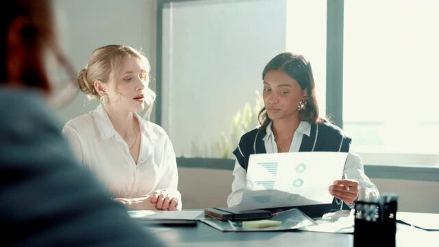 Business people, charts and women in office, documents and cooperation with budget report. Employees, accounting or financial advisor in meeting, graphs or planning for profit growth, audit and taxes