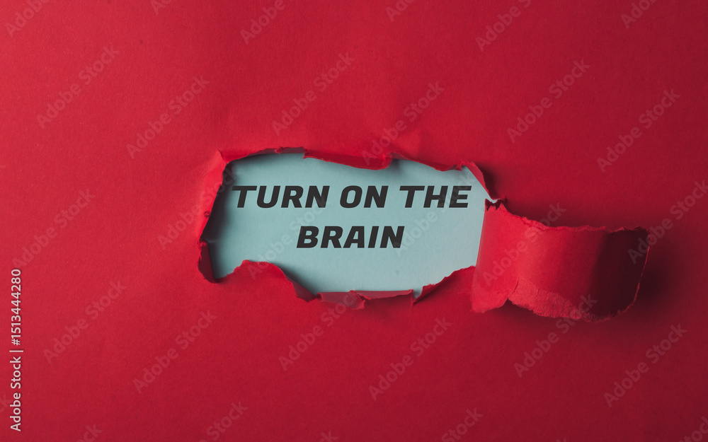 Poster red paper with a hole in it and the words turn on the brain written on it