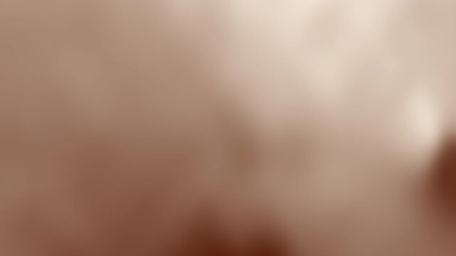 A soft, blurred brown background with no discernible objects or features, Abstract texture Gradient motion Background animation.