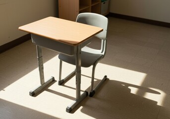 Empty school desk and chair in a classroom setting