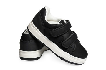 Black sport shoes on white background – isolated athletic footwear