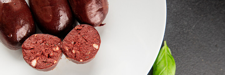 Black pudding sausage fresh delicious gourmet food background on the table rustic food top view...