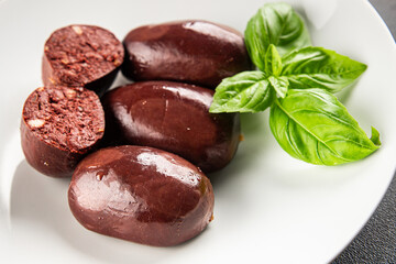Black pudding sausage fresh delicious gourmet food background on the table rustic food top view...