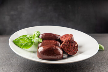 Black pudding sausage fresh delicious gourmet food background on the table rustic food top view...