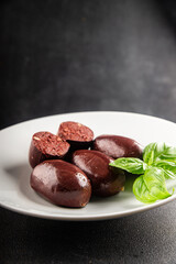 Black pudding sausage fresh delicious gourmet food background on the table rustic food top view copy space