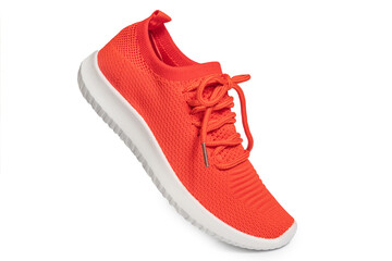 Orange sneakers isolated on white background – vibrant athletic shoes