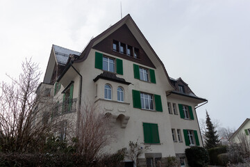 A classic residential building, likely a villa or a large townhouse, stands prominently in St....