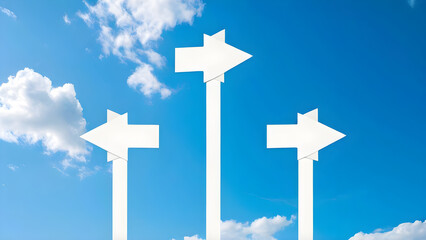 Three White Arrow Signs Pointing in Different Directions Against Blue Sky

