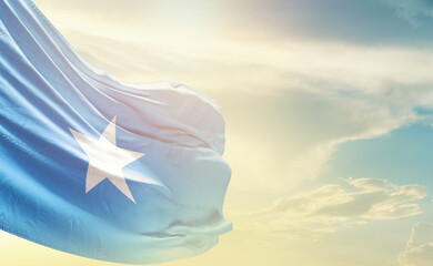 Somalia flag wave in soft clouds. National flag beautifully waving in the sky. Somalia national flag for independence day.