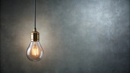 Illuminated Filament Bulb Hanging Against a Textured Wall