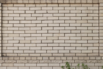 White brick wall, background. Light dirty brick, fence. Close-up of white brick exterior wall....