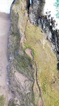 Vertical view of Sango Sands Viewpoint in Durness, Scotland, showcasing coastal rock formations