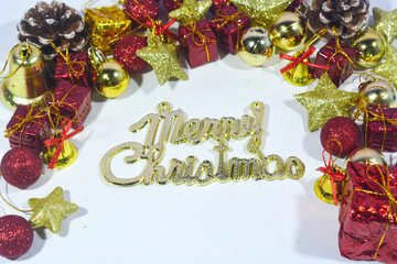 Christmas background with xmas tree and sparkle bokeh lights on red canvas background. Merry...