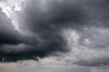dark storm clouds with background,Dark clouds before a thunder-storm.	
