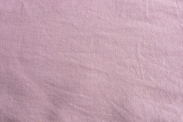 Soft pastel fabric background with subtle texture detail in light purple hue