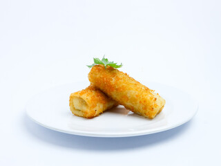 Two pieces of crispy risol mayo served on a clean white plate, isolated on a white background. Ideal for food advertising, menu design, or culinary content
