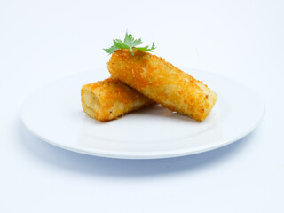 Two pieces of crispy risol mayo served on a clean white plate, isolated on a white background. Ideal for food advertising, menu design, or culinary content
