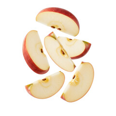 Slices of red apples float mid-air against a white backdrop, displaying their fresh cut texture