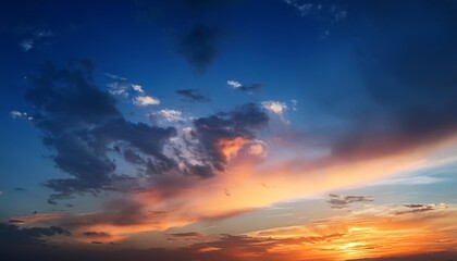 Obraz premium the dramatic colors of the sunset in the sky gradient from blue to orange