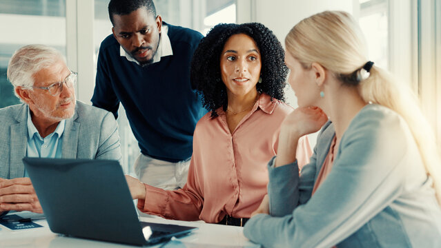 Collaboration, colleagues and group with laptop, discussion or investment ideas for business growth. Meeting, financial analyst and people with tech for market trends, talking and teamwork in office