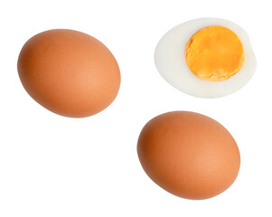 Top view set of raw brown chicken eggs and cooked or boiled chicken egg with egg yolk in half isolated with clipping path in png file format