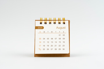 August 2025 Mini desk calendar on white.