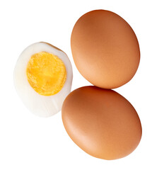 Top view of raw brown chicken eggs and cooked or boiled chicken egg with egg yolk in half isolated on white background with clipping path