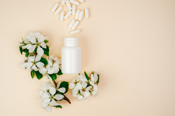 Jar with pills on beige background. Health concept. Medicine, pills, flu and cold, headache