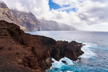 View of the fjords. A pleasant landscape with the ocean and large rocks