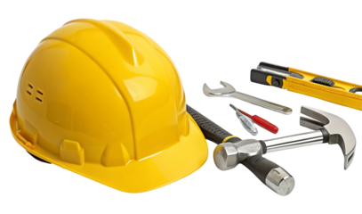 A still life composition featuring a yellow hard hat and various construction tools on a black background