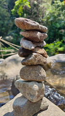 A balanced stack of rocks in nature