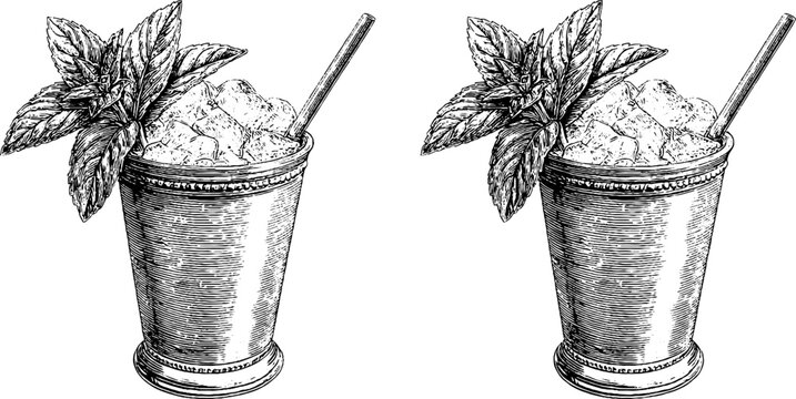 Vintage engraved mint julep glasses with ice and mint leaves for refreshing summer drinks