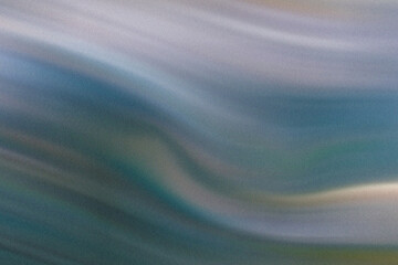 Abstract teal and gray swirling motion blur background