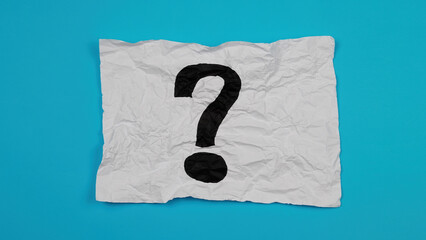question mark drawn on crumpled paper