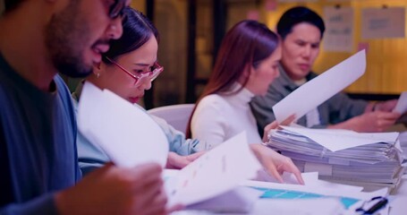 Overloaded office workers struggle with paperwork and deadlines in a late-night scene. Multicultural business team faces stress, frustration, and pressure in high-stakes work environment. - Powered by Adobe