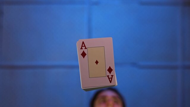Fototapeta Dynamic Floating Ace of Diamonds Card Below the Glass Table