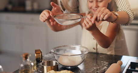 Baking, parent and child with ingredients in kitchen, teaching and helping for dessert or meal prep. Cooking, person and daughter with flour for culinary skills, growth and development of kid in home